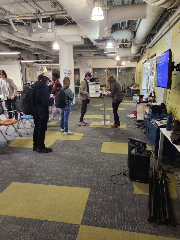 Author Cheryl Platz signs bookplates and books for students after her guest lecture at Drexel University's Entrepreneurial Game Studio.