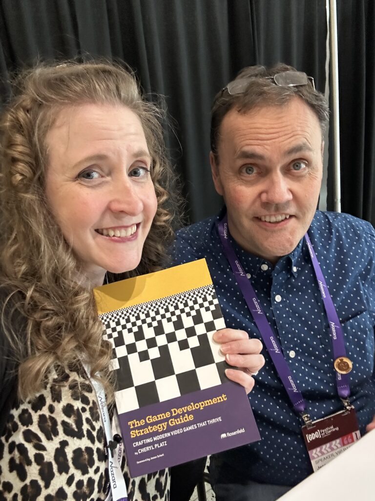 Game Development Strategy Guide author Cheryl Platz and foreword author Jesse Schell at their joint book signing at GDC 2026 in San Francisco, CA